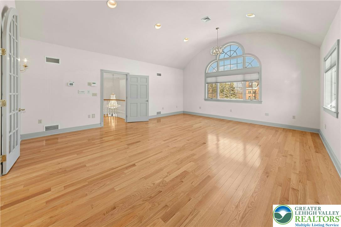 3640 Manor Road Bethlehem, PA 18020 - Photo 24 of 36 an empty room with wooden floor and window
