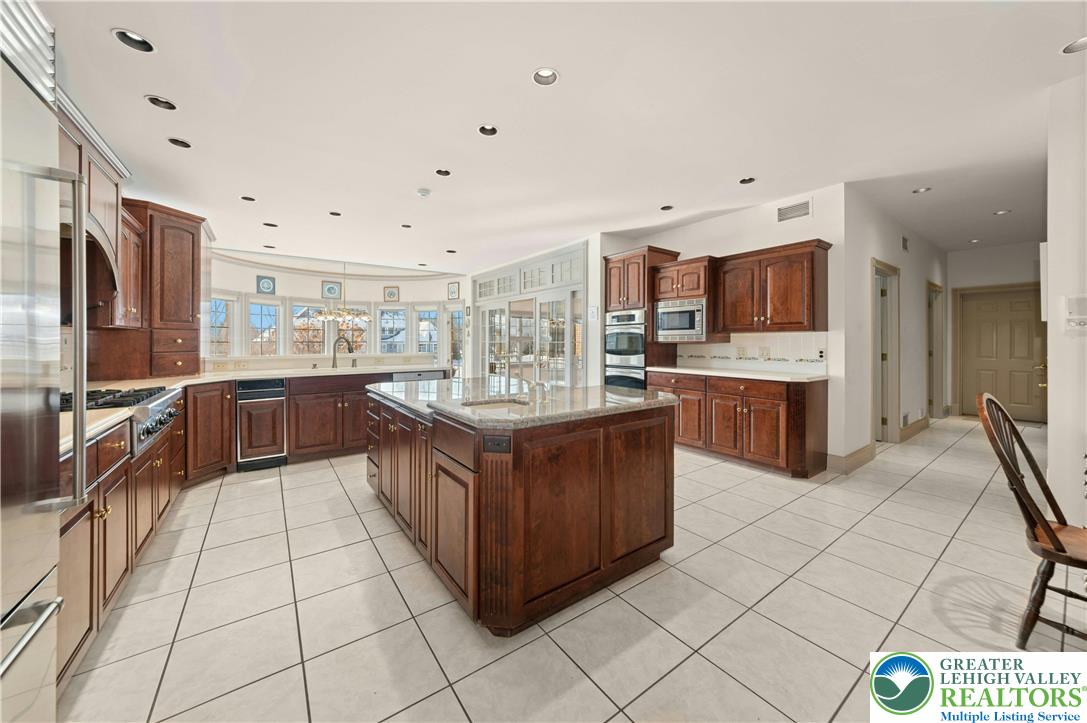 3640 Manor Road Bethlehem, PA 18020 - Photo 46 of 46 a large kitchen with stainless steel appliances lots of counter top space