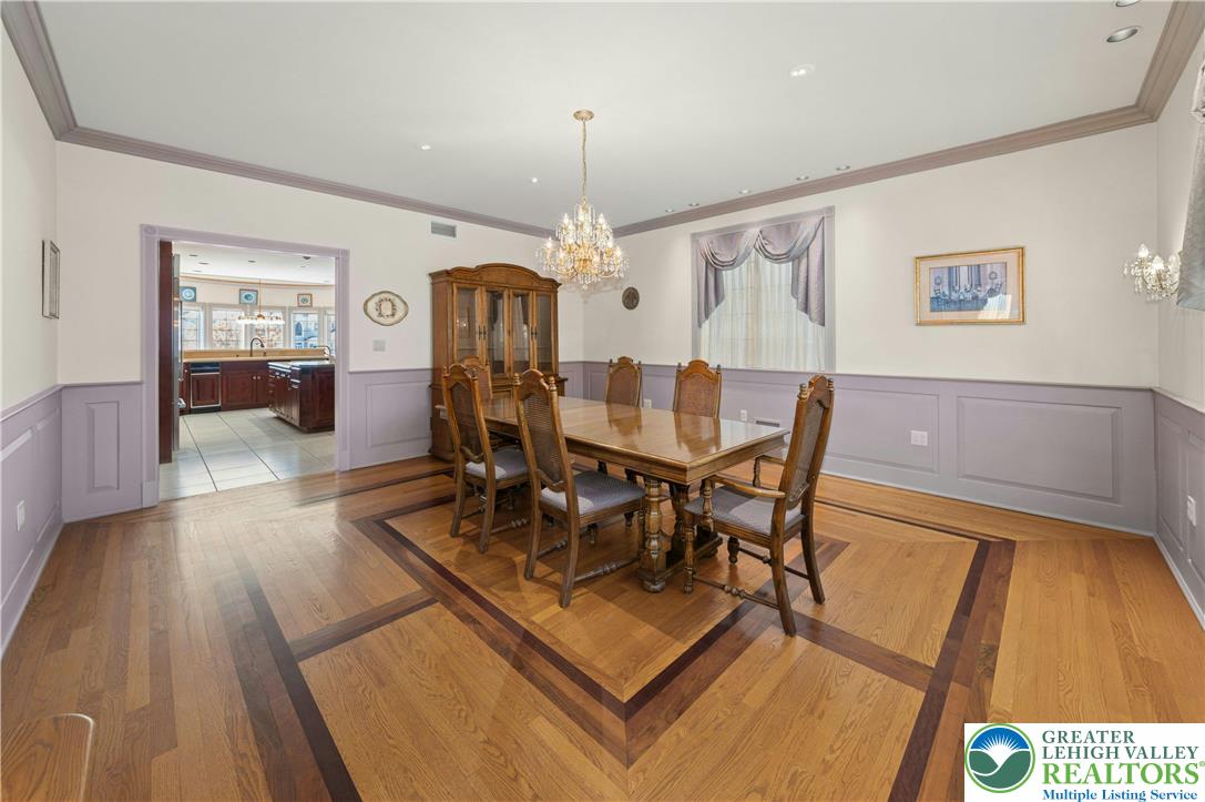 3640 Manor Road Bethlehem, PA 18020 - Photo 7 of 36 a view of a dining room with furniture window and wooden floor