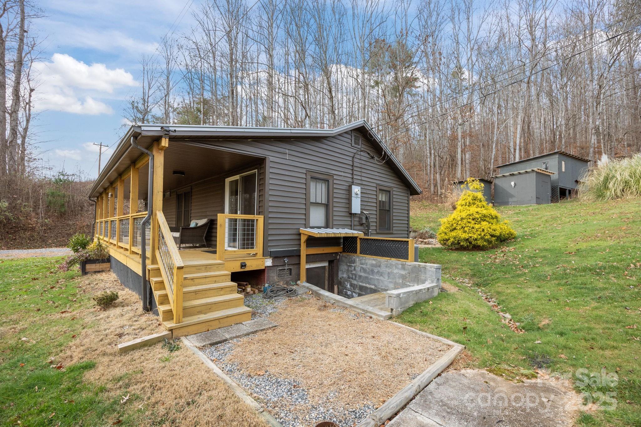 731 Don Felmet Road Marshall, NC 28753 - Photo 19 of 23 a view of backyard with seating space