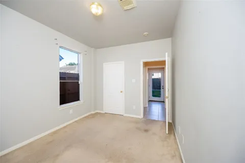a bathroom with a double vanity sink toilet mirror and bathtub