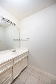 a bathroom with a toilet and a bathtub