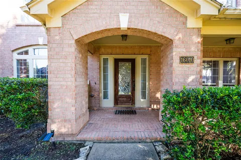 a view of a building with potted plants