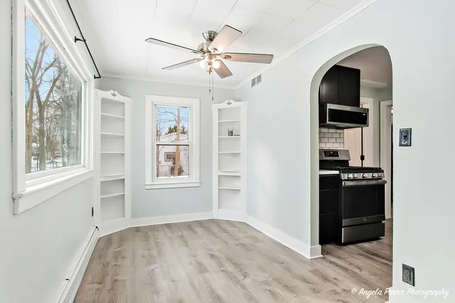 a view of a windows and an entryway in a room