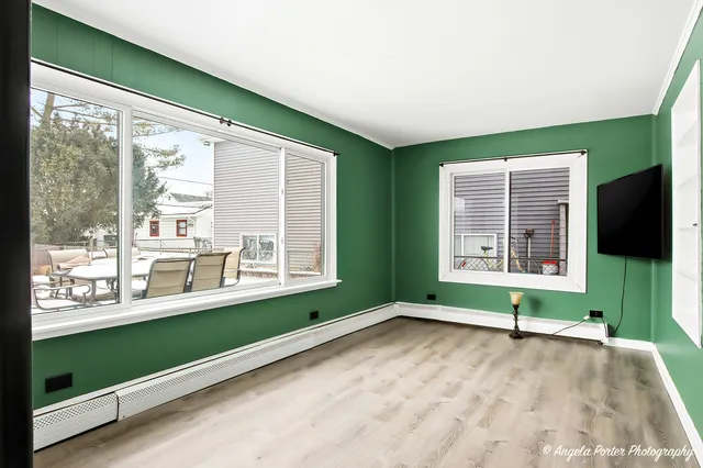 a view of a room with a large window