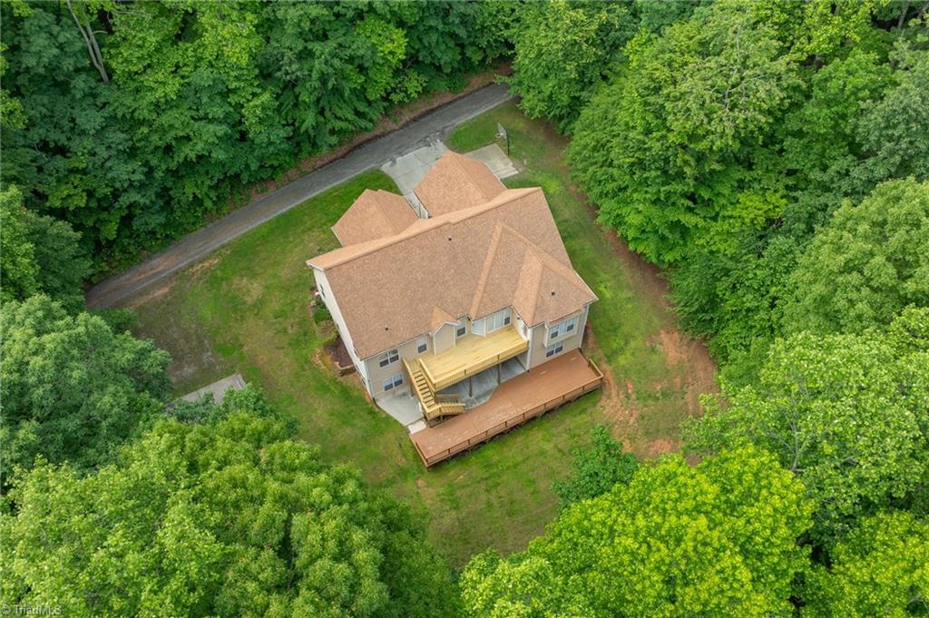 Nestled on a ONE Acre lot right off Wallburg High Point Road