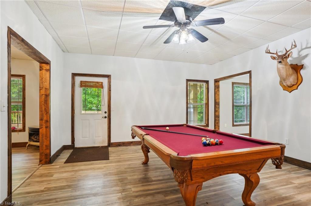 449 Wallburg-High Point Road Winston-Salem, NC 27107 - Photo 39 of 50 Pool table room with exterior door to patio and deck