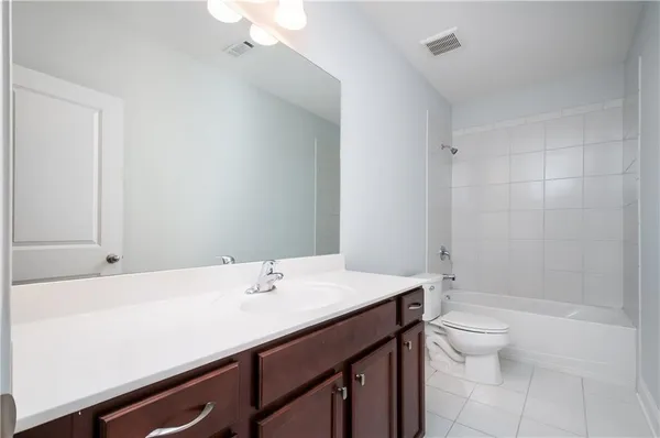 a view of balcony with wooden floor and fence