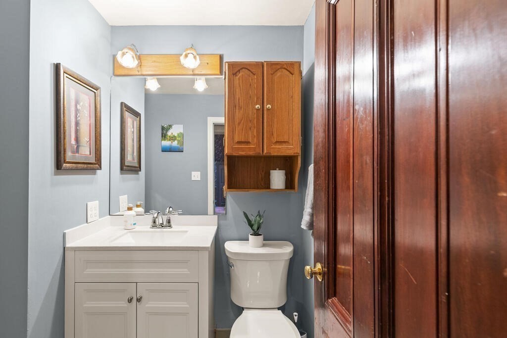 4 Rangeley Road Winchester, MA 01890 - Photo 12 of 42 a bathroom with a sink a toilet and mirror