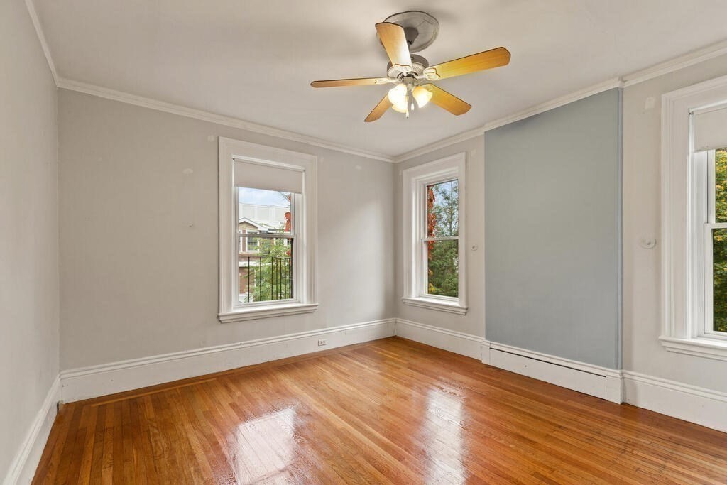 4 Rangeley Road Winchester, MA 01890 - Photo 21 of 42 a view of an empty room with wooden floor and a window