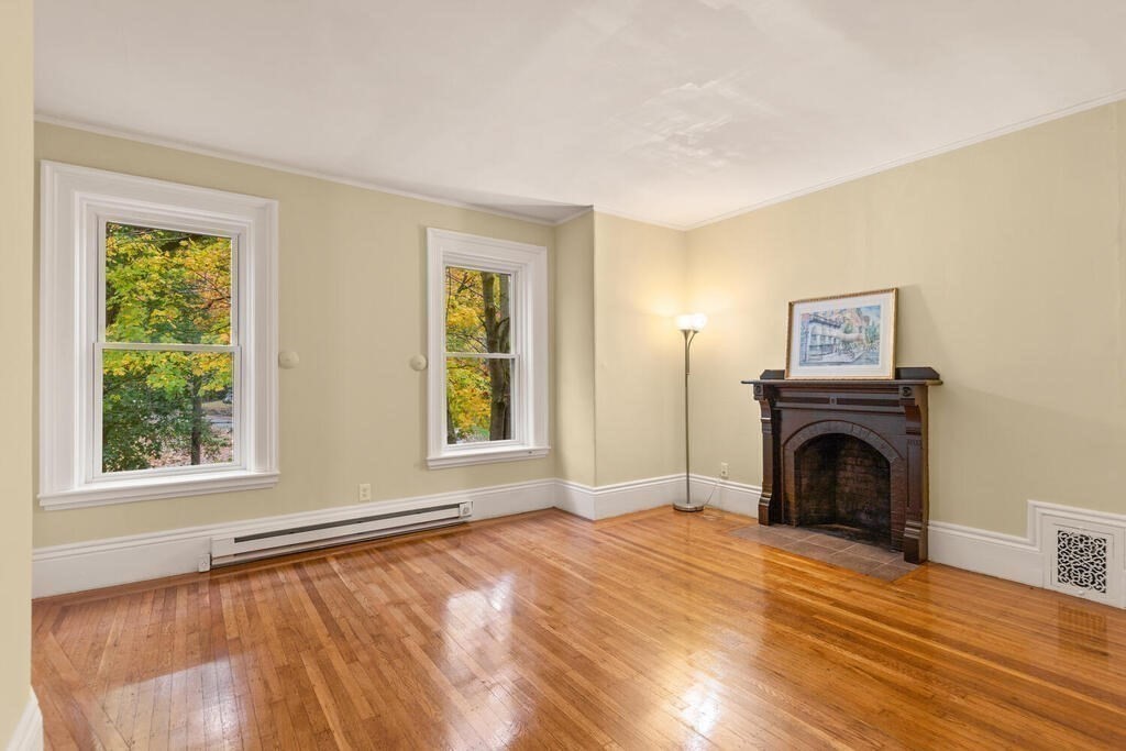 4 Rangeley Road Winchester, MA 01890 - Photo 24 of 42 a view of empty room with fireplace and wooden floor