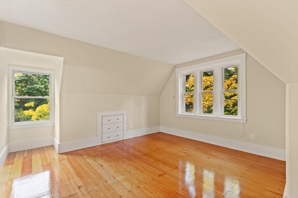 4 Rangeley Road Winchester, MA 01890 - Photo 28 of 42 a view of an empty room with window and wooden floor