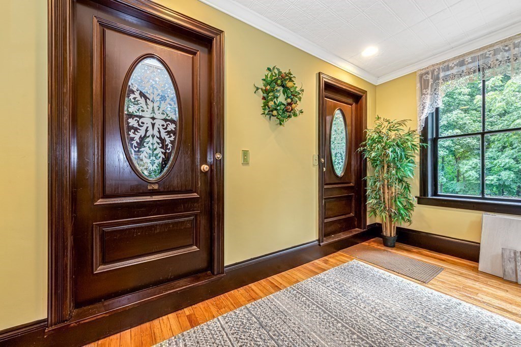4 Rangeley Road Winchester, MA 01890 - Photo 4 of 42 a view of front door with wooden floor