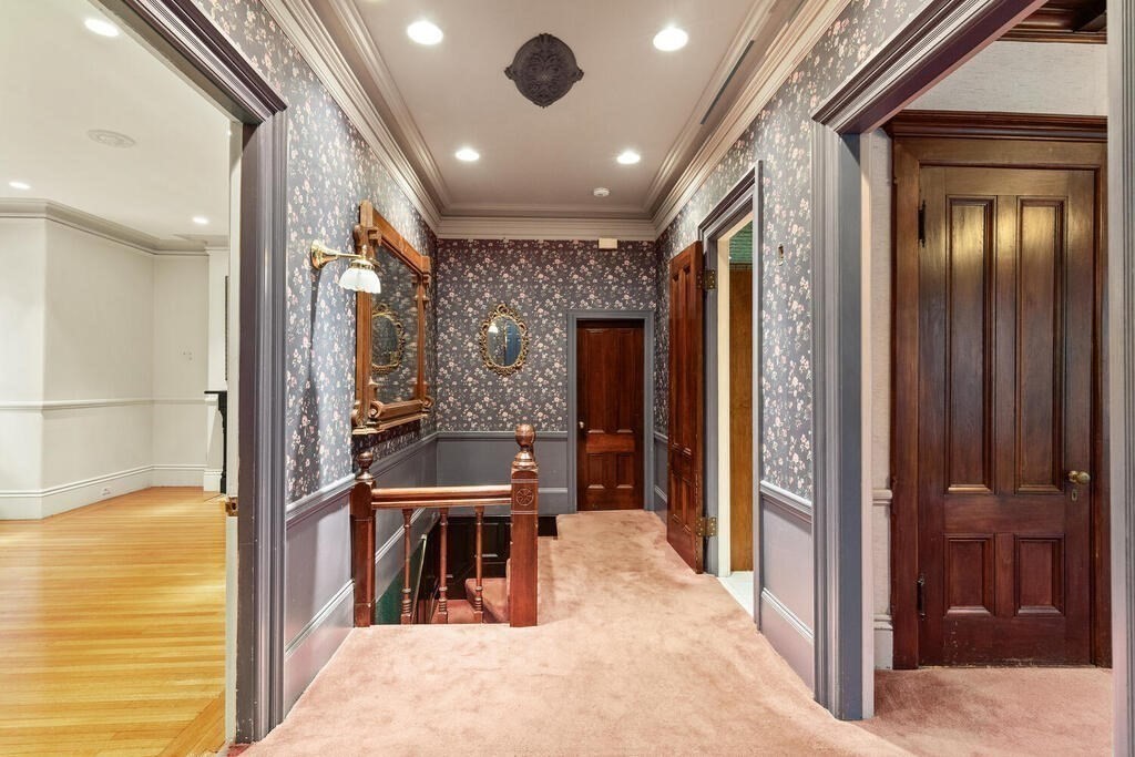 4 Rangeley Road Winchester, MA 01890 - Photo 6 of 42 a view of a hallway with dining area and glass door
