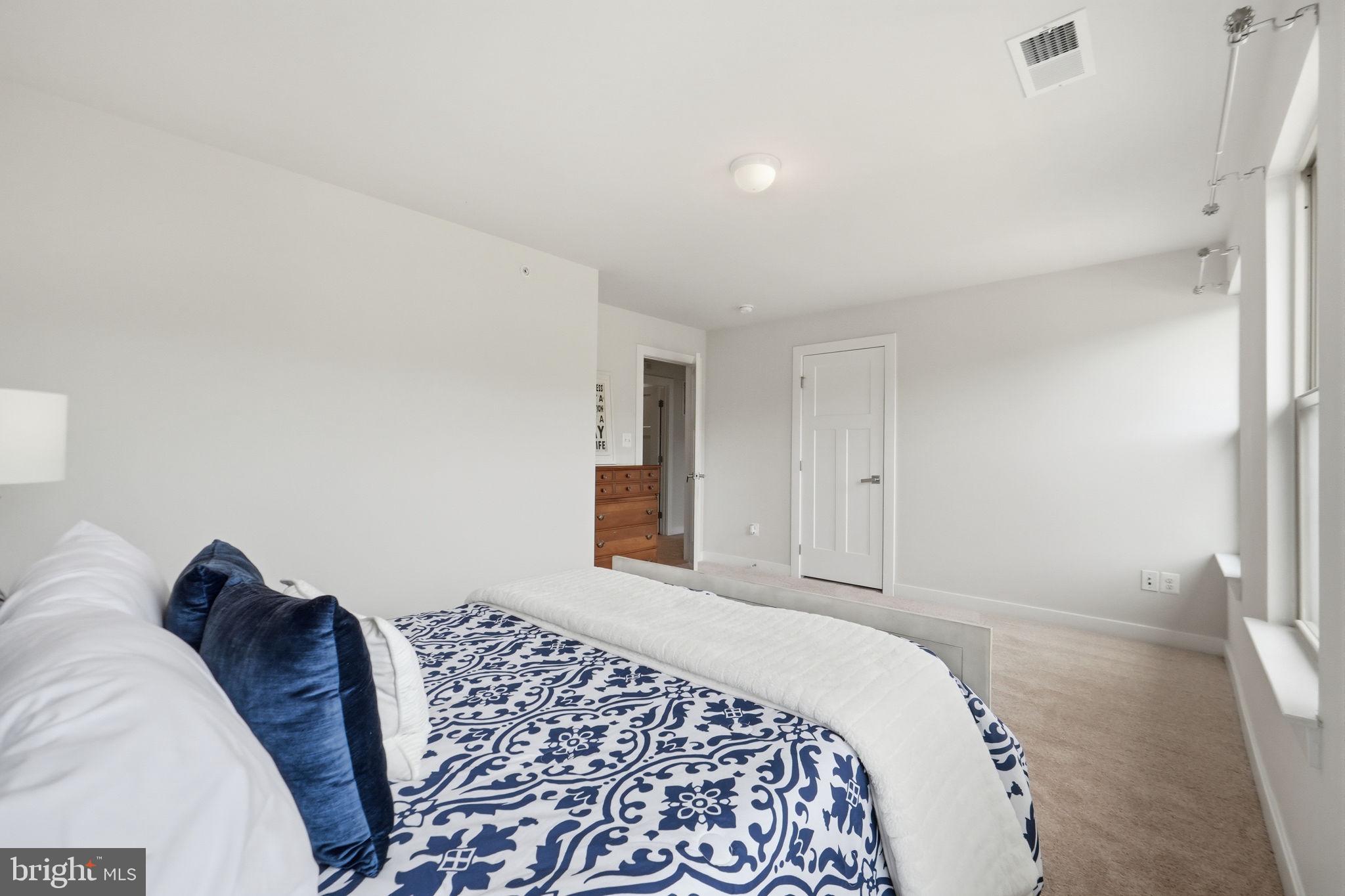 2269 River Birch Road Dumfries, VA 22026 - Photo 14 of 29 Serene bedroom with natural light.