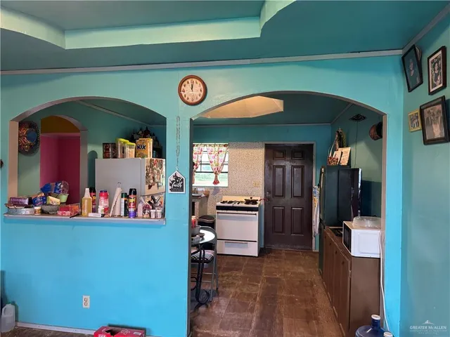 a view of a kitchen and utility room