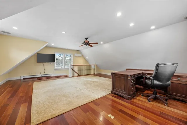 a view of a workspace with furniture