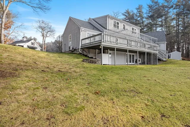 a view of a white house with a large windows