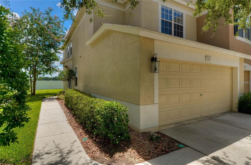 4744 Pond Ridge Drive Riverview, FL 33578 - Photo 1 of 18 a view of a pathway both side of the house