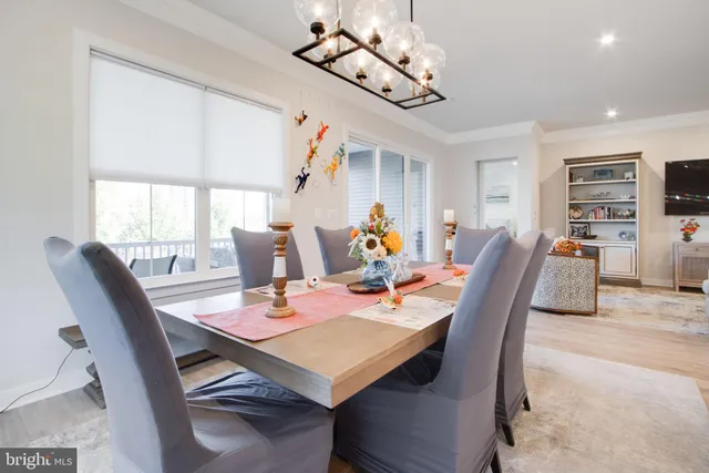 a bathroom with a granite countertop sink toilet and a mirror