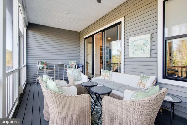 a bedroom with a bed and a painting