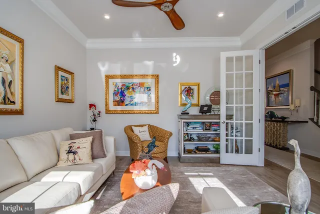 a kitchen with granite countertop a sink dishwasher stove and cabinets