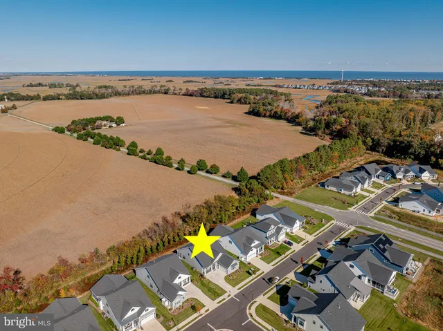 a view of a house with a door and wooden walls