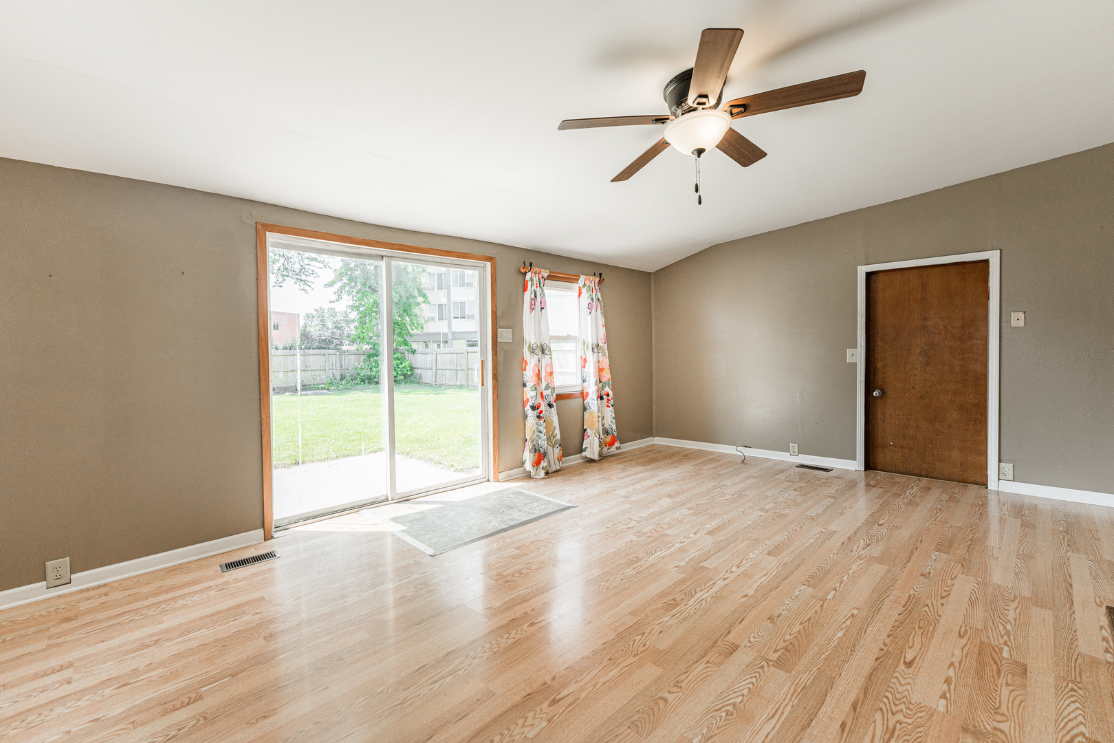 344 Grant Street Sycamore, IL 60178 - Photo 13 of 29 a view of an empty room with a window and wooden floor