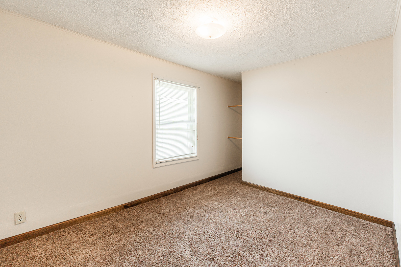 344 Grant Street Sycamore, IL 60178 - Photo 19 of 29 an empty room with a window