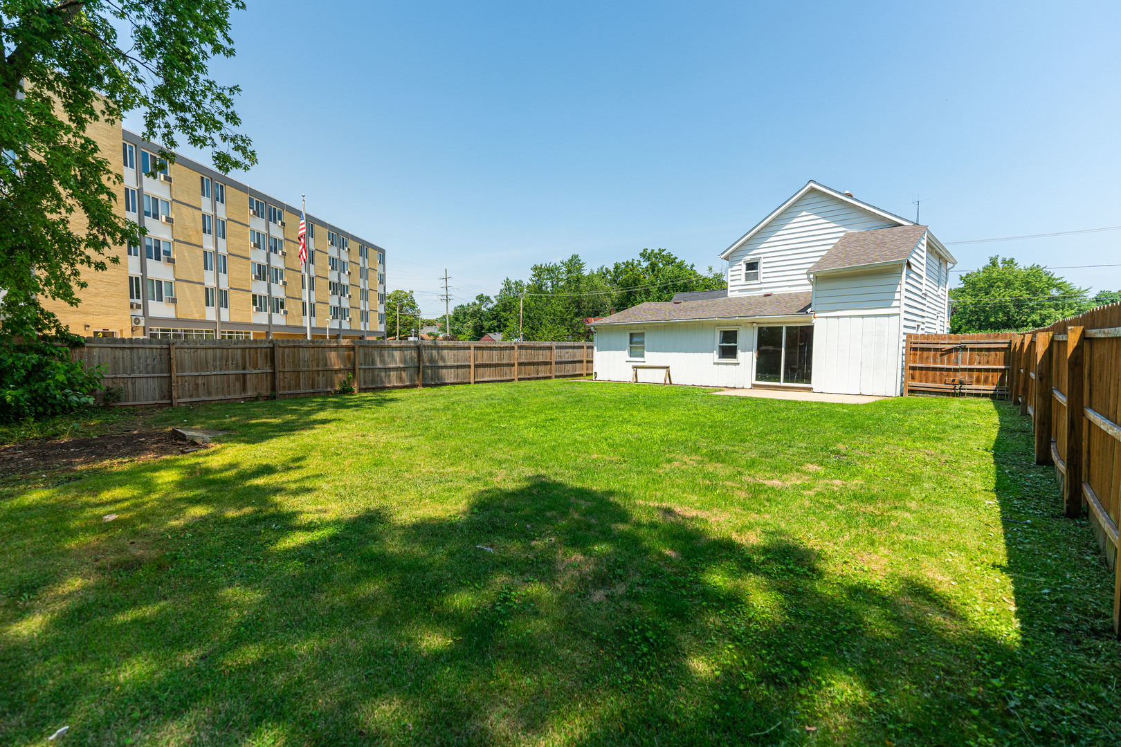 344 Grant Street Sycamore, IL 60178 - Photo 27 of 29 a view of a house with a yard and sitting area