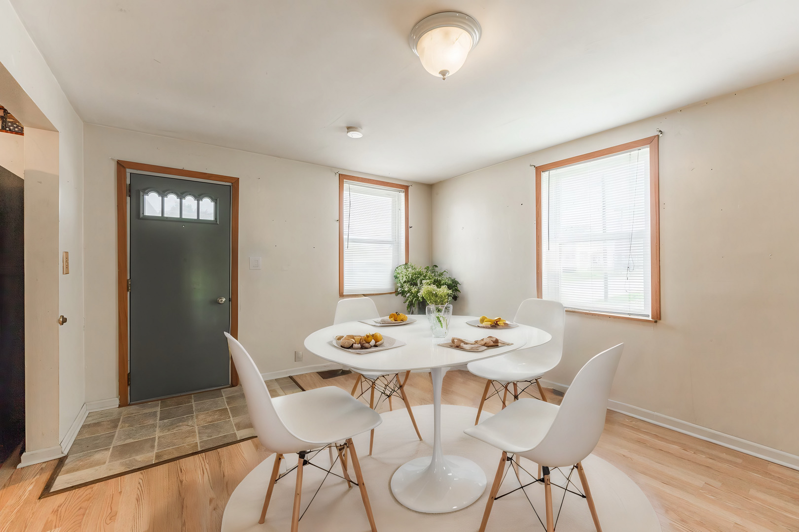 344 Grant Street Sycamore, IL 60178 - Photo 5 of 29 a view of a dining room with furniture and wooden floor