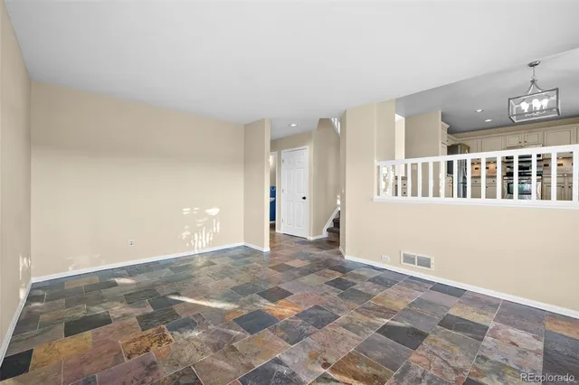 a view of a bedroom with a empty space