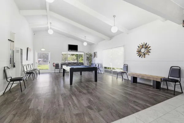 a view of a swimming pool with a lake