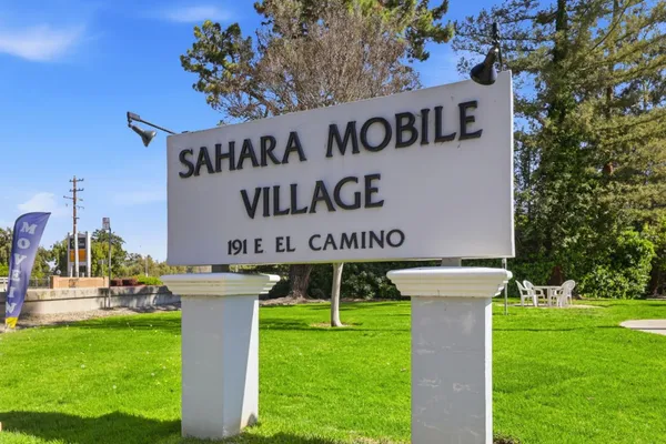 a view of a house with a street