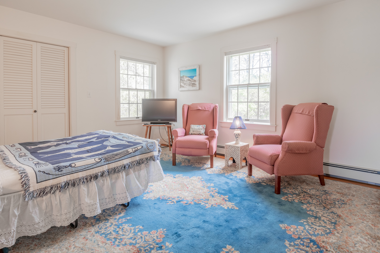 15 Swift Rock Road Nantucket, MA 02554 - Photo 18 of 32 a bed room with furniture and a window