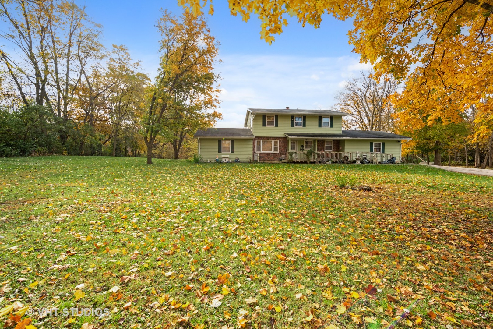 18607 McGuire Road Harvard, IL 60033 - Photo 3 of 14 a view of a house with a yard