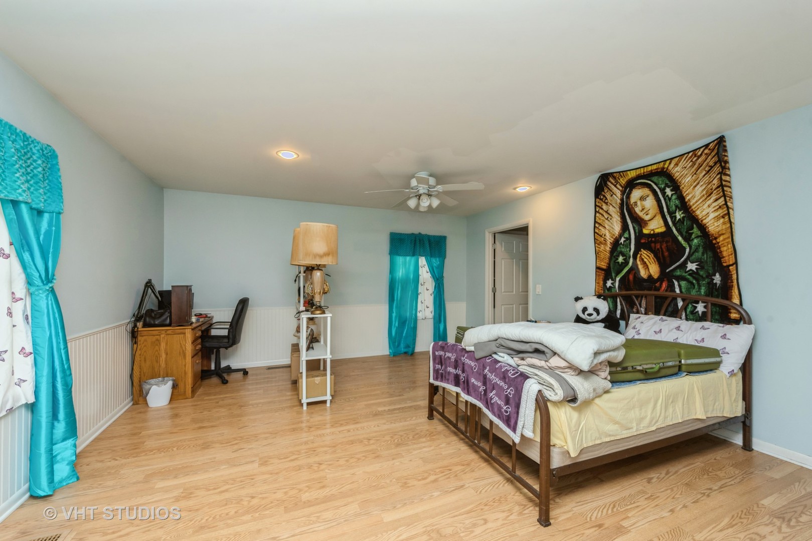 18607 McGuire Road Harvard, IL 60033 - Photo 8 of 14 a bedroom with a bed and wooden floor