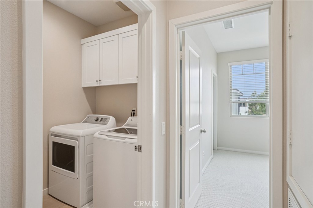 143 Frame Irvine, CA 92618 - Photo 24 of 41 a utility room with dryer and washer