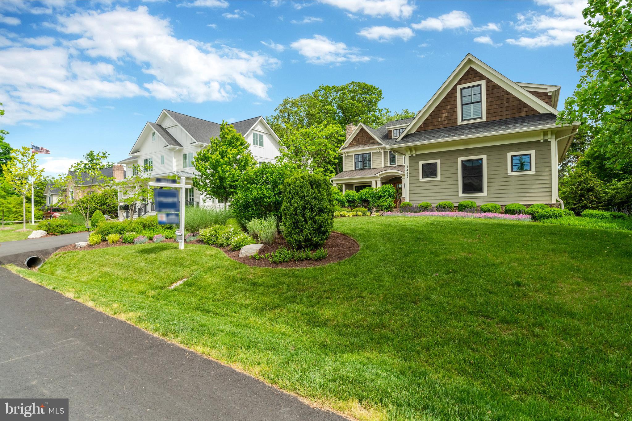 1415 Kurtz Road McLean, VA 22101 - Photo 117 of 129 a front view of a house with a yard and trees