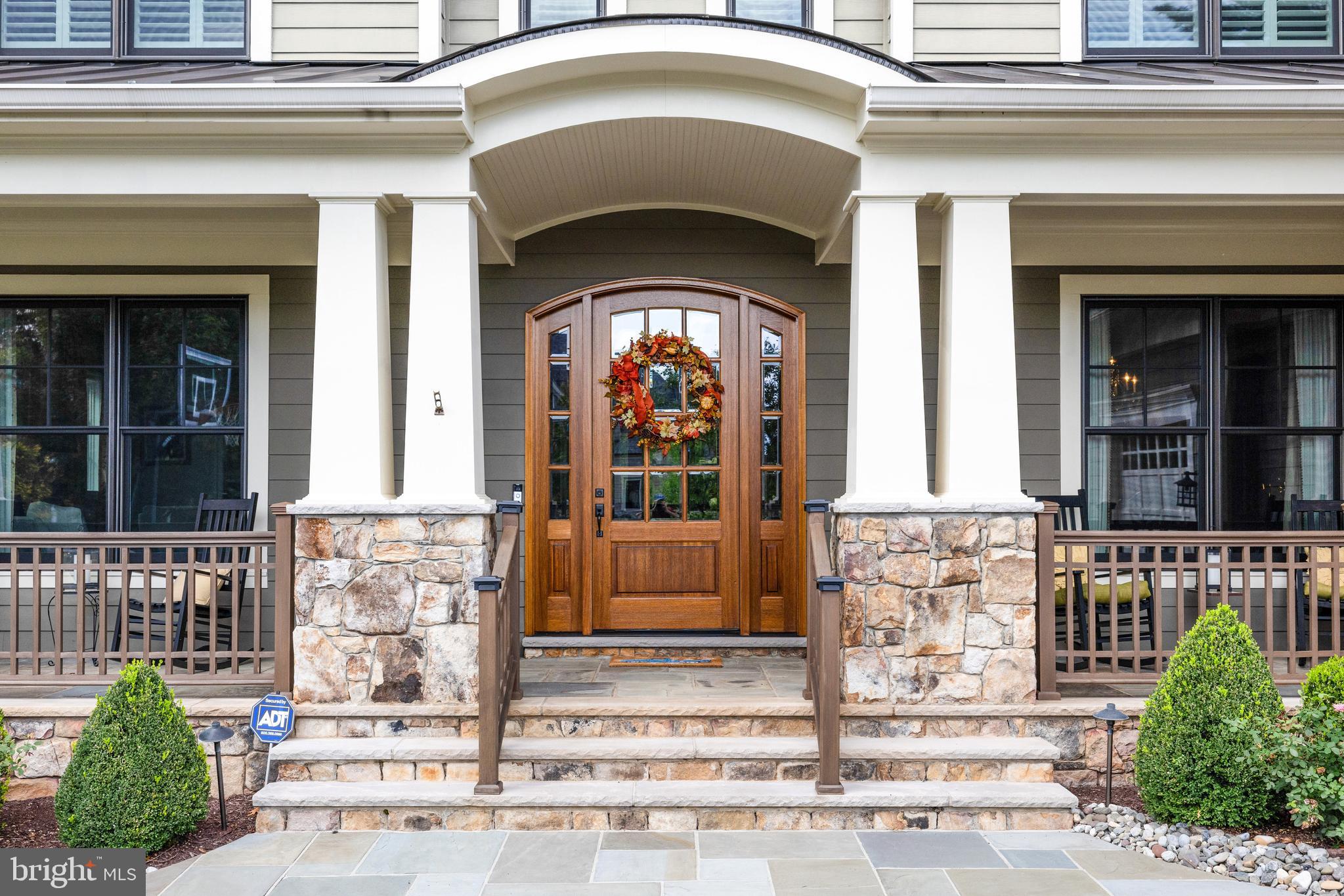 1415 Kurtz Road McLean, VA 22101 - Photo 124 of 129 a front view of a house with a garden
