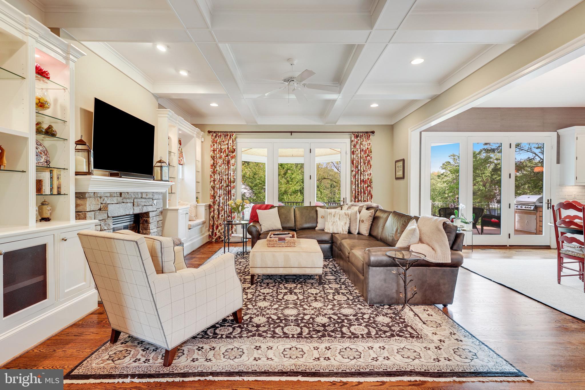 1415 Kurtz Road McLean, VA 22101 - Photo 21 of 129 a living room with fireplace furniture and a flat screen tv