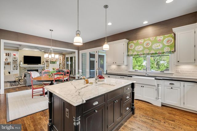 a bedroom with furniture and a flat screen tv