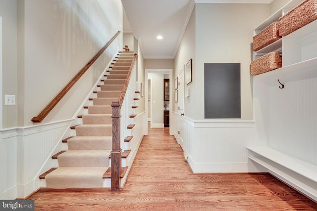 a view of a deck with furniture and a yard