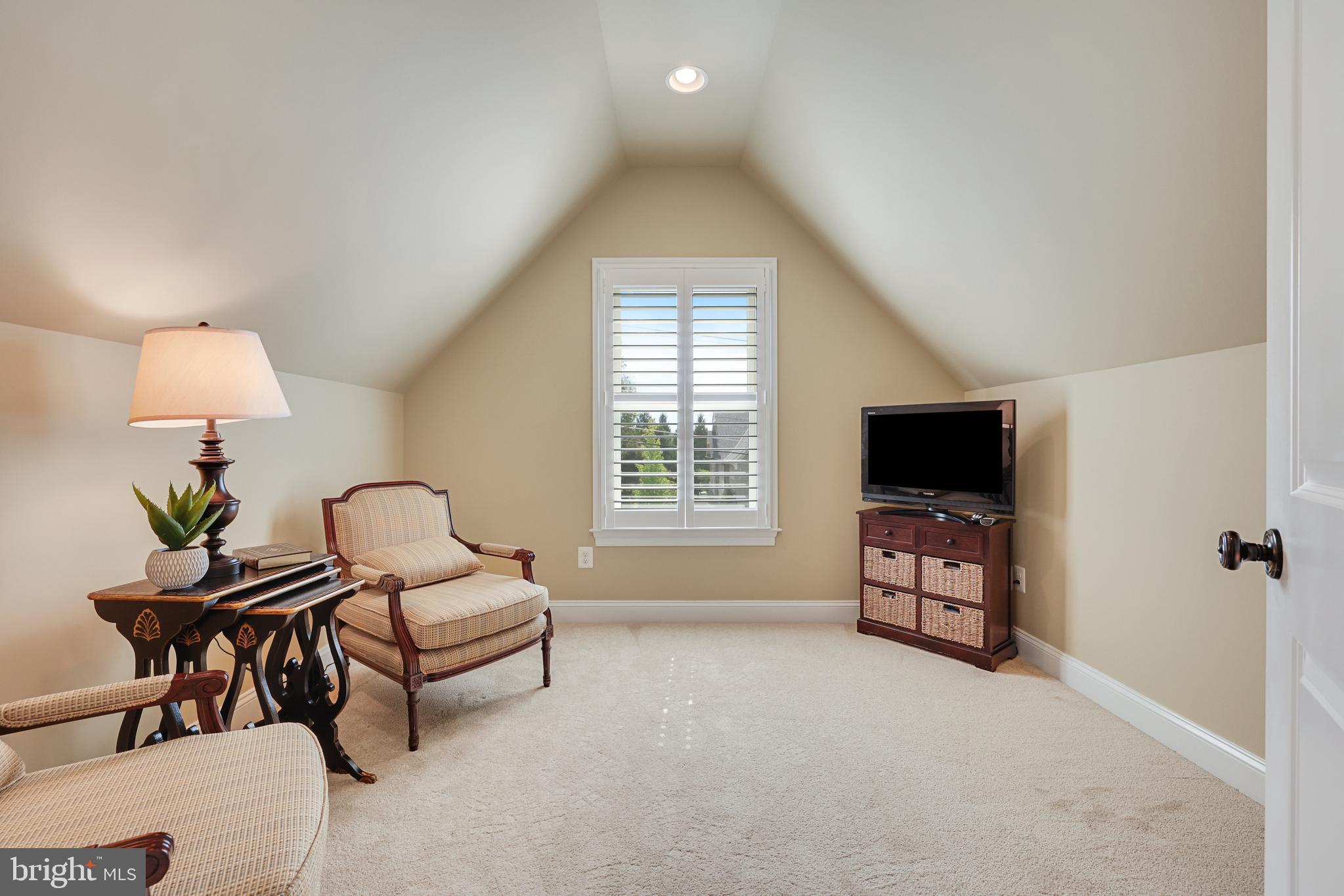 1415 Kurtz Road McLean, VA 22101 - Photo 69 of 129 a bedroom with furniture and a flat screen tv