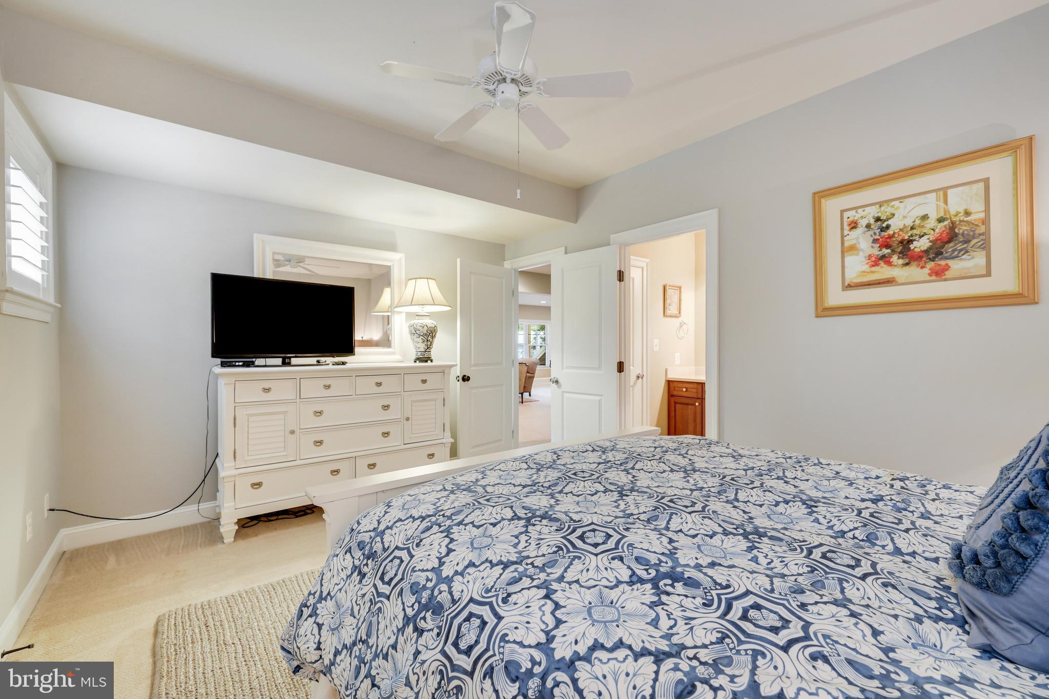 1415 Kurtz Road McLean, VA 22101 - Photo 85 of 129 a bedroom with a flat screen tv on dresser and a flat screen tv