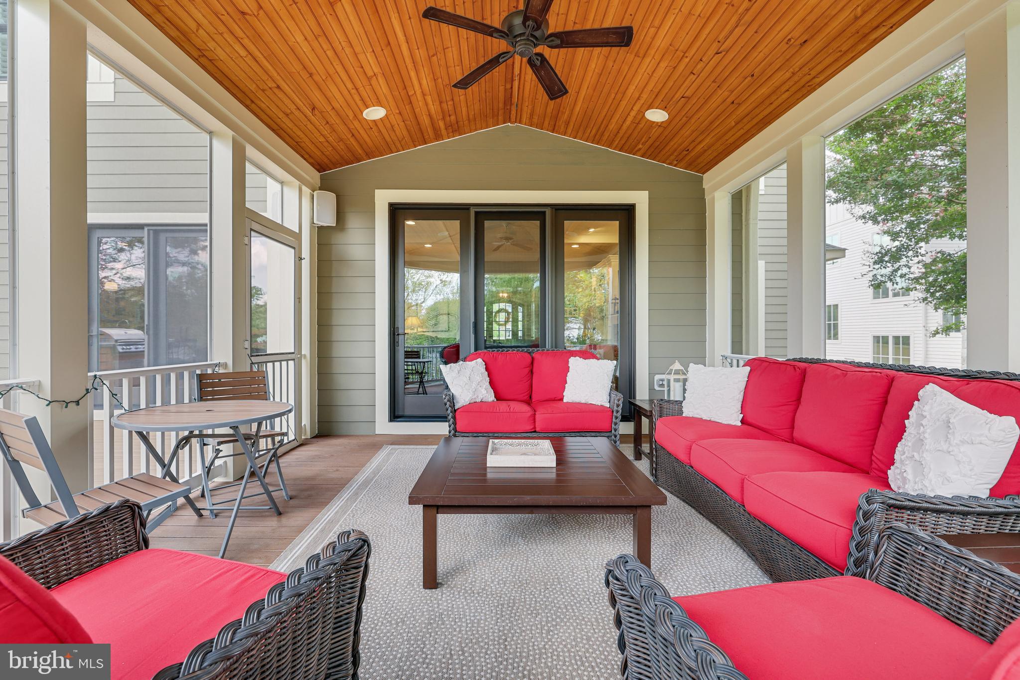 1415 Kurtz Road McLean, VA 22101 - Photo 89 of 129 a living room with furniture and floor to ceiling windows