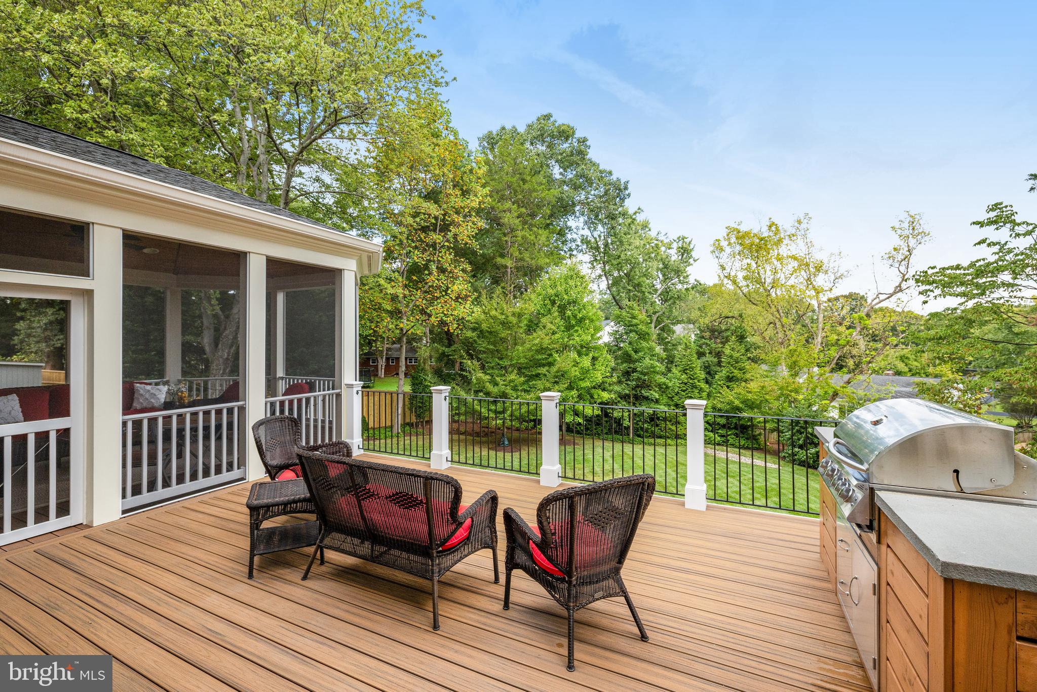 1415 Kurtz Road McLean, VA 22101 - Photo 94 of 129 a view of a deck with furniture and a yard