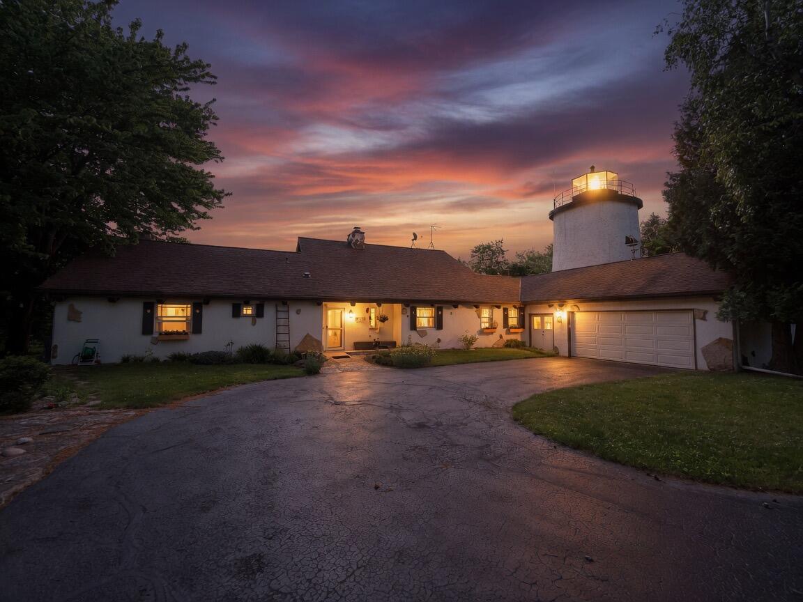 1270 Lake Shore Road Grafton, WI 53024 - Photo 1 of 99 Rare! Once in a lifetime opportunity to own one of Wisconsin's most iconic Waterfront Estates!