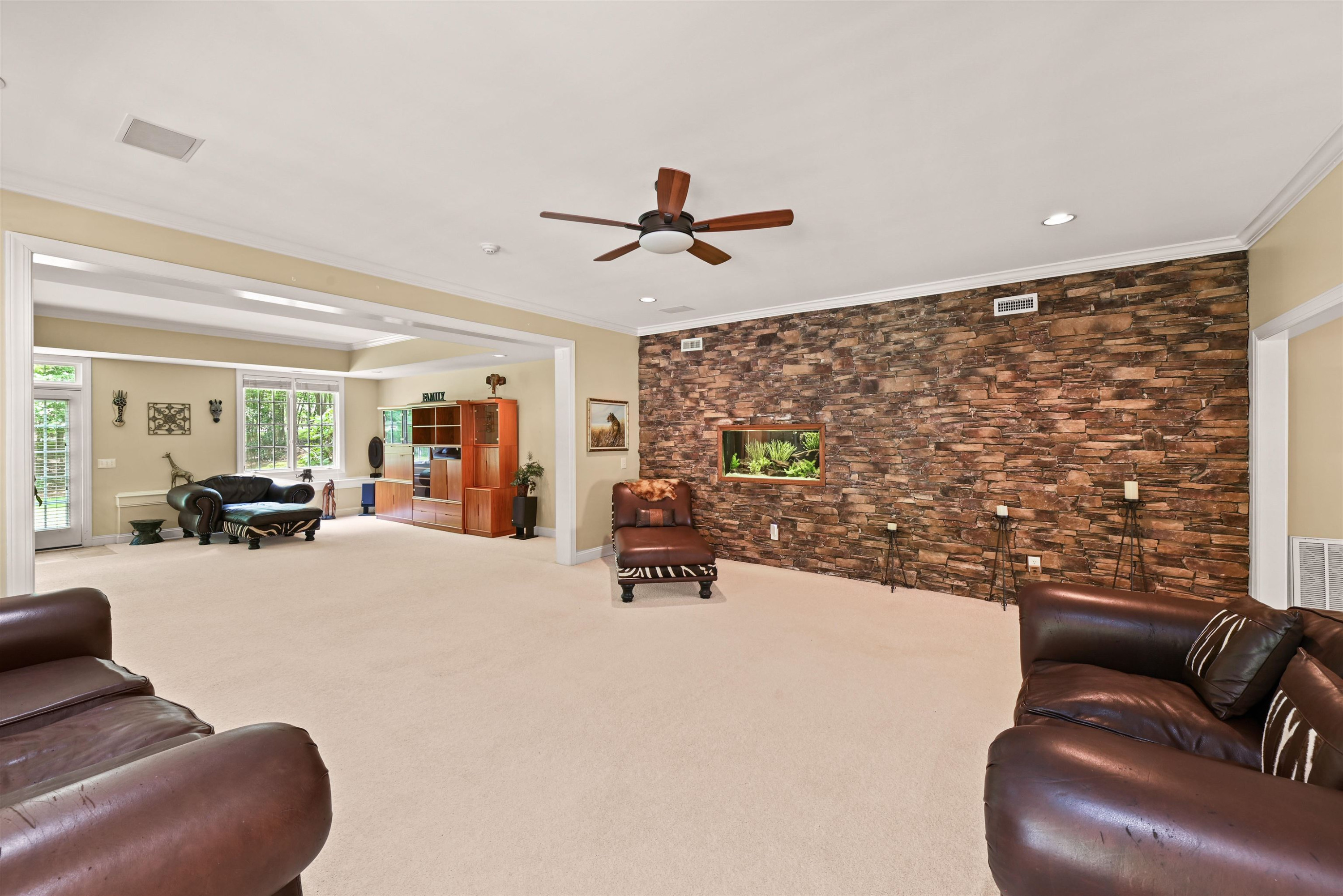 5120 Birchleaf Drive Raleigh, NC 27606 - Photo 41 of 57 This space has so much versatility it can accommodate most functions with ease Basement gathering area
