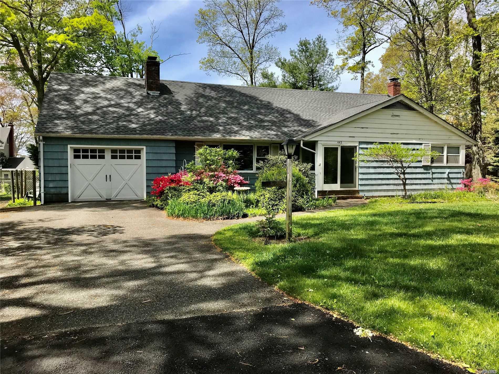 a front view of house with yard